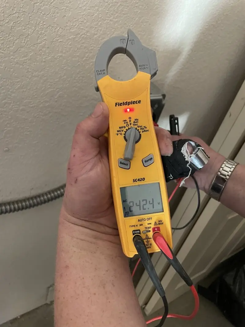 Voltage testing with clamp meter during Electrical Installation Services in Zephyrhills West